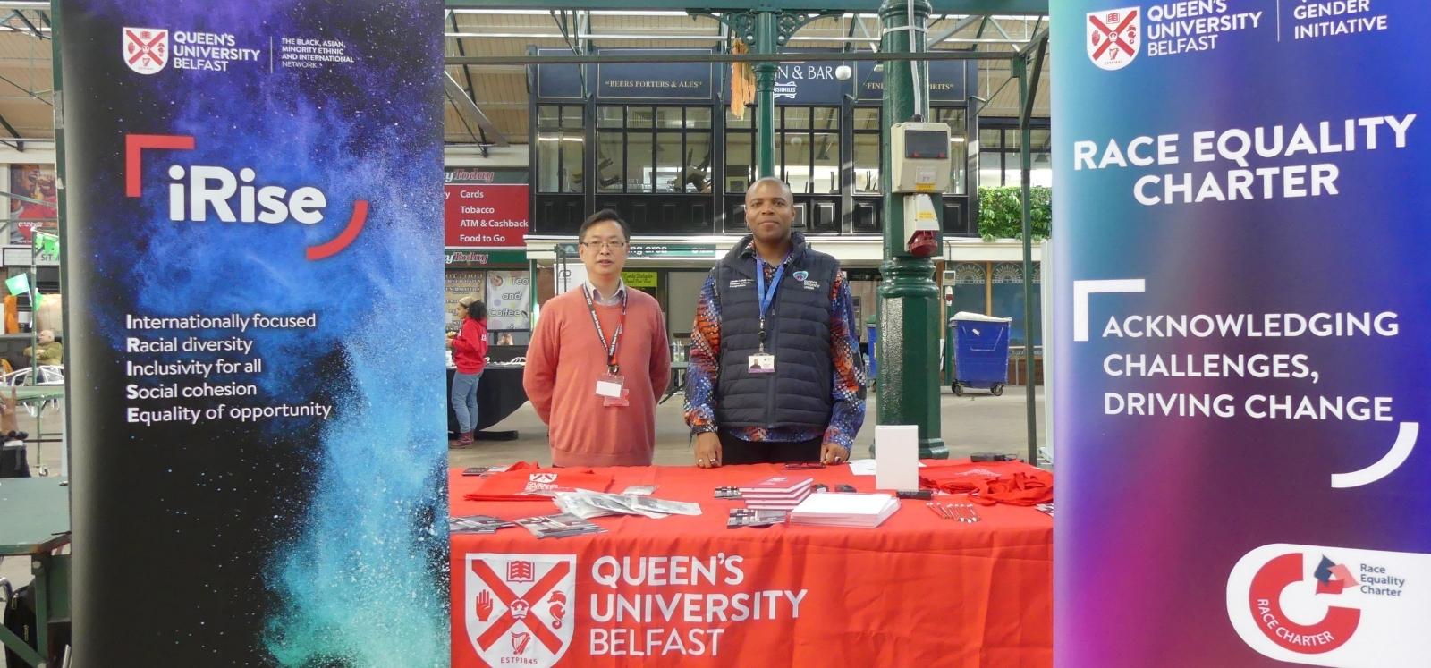 Dr Liang Wang and Jamie-Lukas Campbell at the iRise-Racial Equality Charter stall at the Black History Month expo, St George's Market