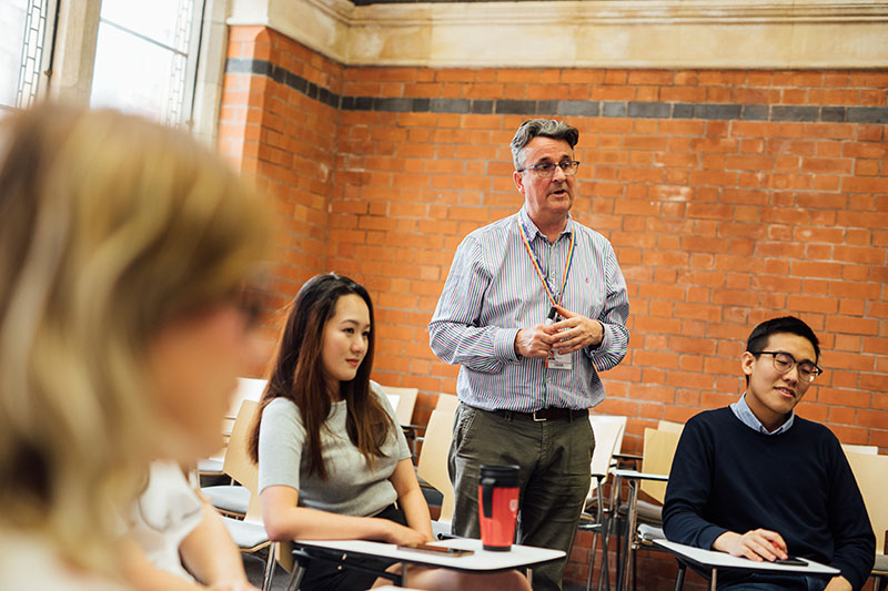 Lecturer with students