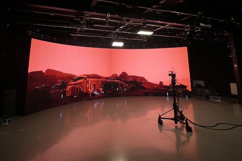 large screen showing a science fiction image in the motion capture lab (MediaLab), Queen's University Belfast