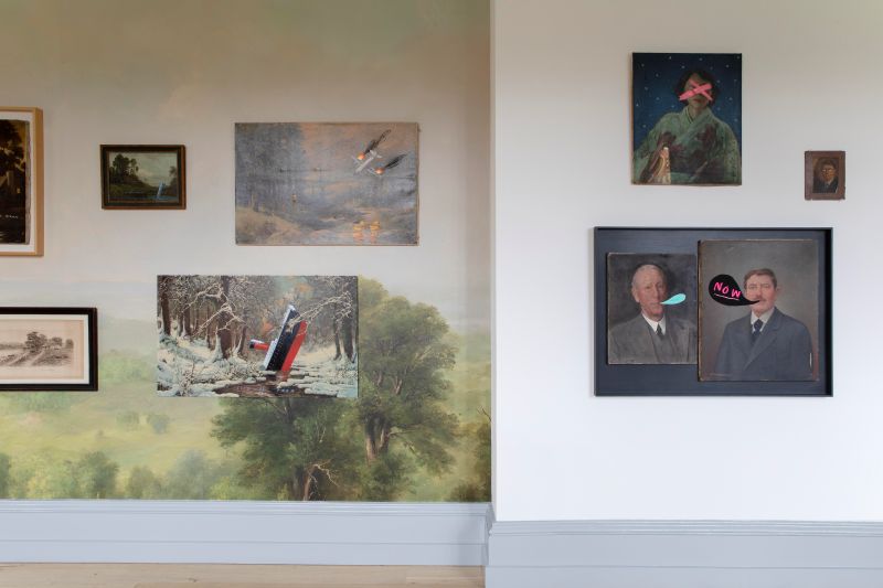 artworks hanging on an art gallery wall